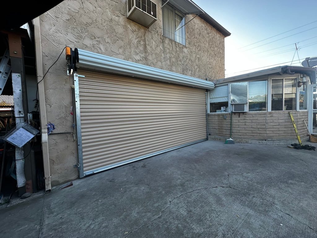 Tan commercial roll-up garage door, La Mesa