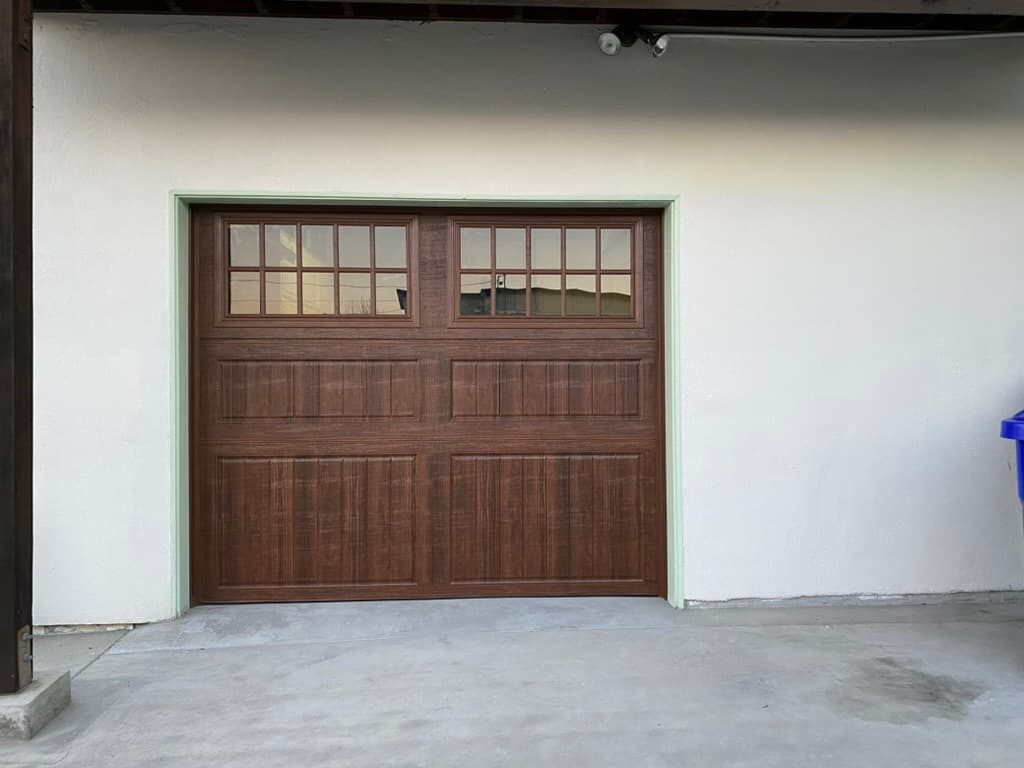 Walnut modern horizontal-slat garage door with frosted side windows, Bankers Hill