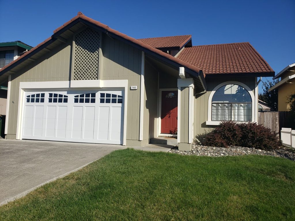 White carriage-style garage door with arched windows, Mira Mesa